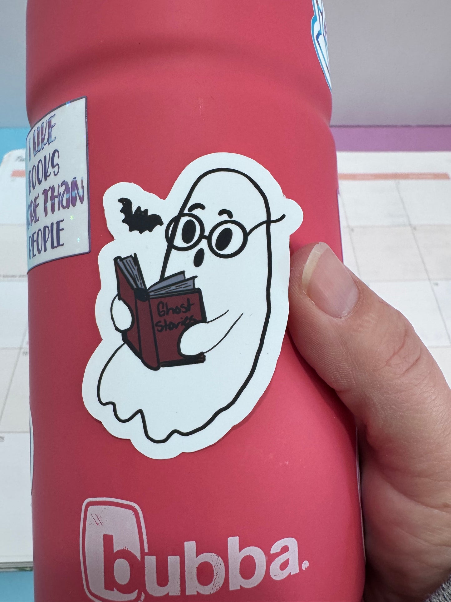 Spooky cute ghost and bat bookish vinyl sticker with matte finish