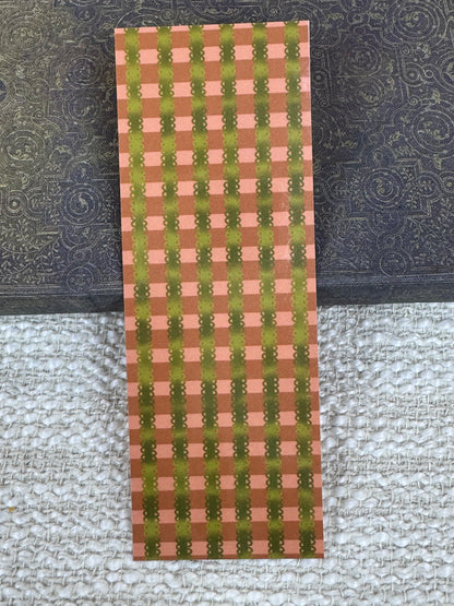 Retro striped bookmark in burnt orange, lighter orange, and greens