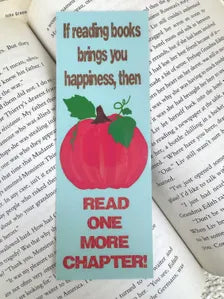 Cute fall bookmark with a pumpkin in the center on a light green back ground that says "if reading books brings you happiness, then read one more chapter"